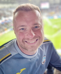 A head and shoulder portrait of Mark Hall